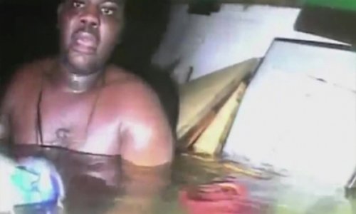 Moment divers found man trapped alive in sunken ship - VIDEO