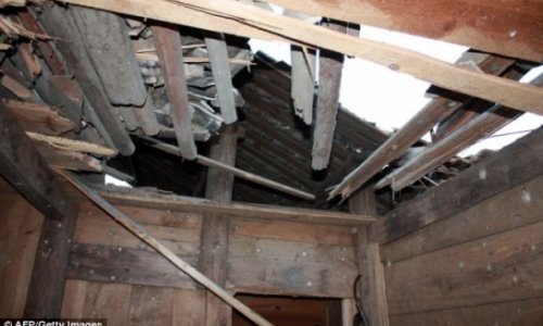 Man claims rocket crashed through the roof of his house