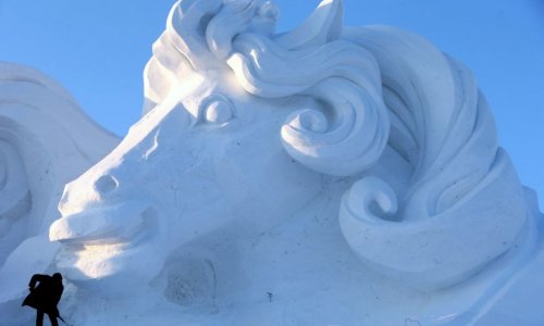 Chinese snow show unveils gigantic 100m-wide sculptures of ice - PHOTO
