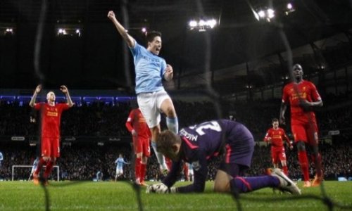 Mignolet howler helps Manchester City beat Liverpool