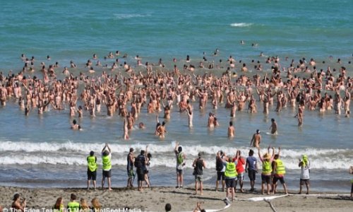 Nude swimmers smash record for largest skinny dip of the world - PHOTO