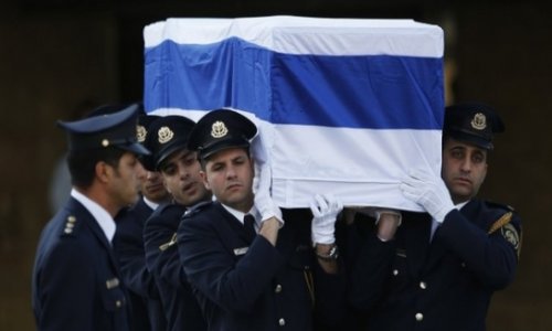 Israel holds burial service for Ariel Sharon