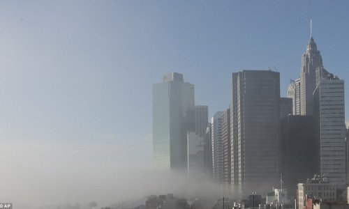 Thick blanket of fog covers New York in morning haze - PHOTO