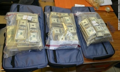 Police find $7.2 million cash stashed in suitcases
