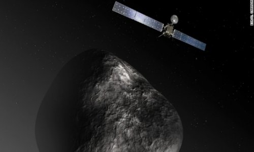 Comet-chasing probe wakes up, calls home - PHOTO