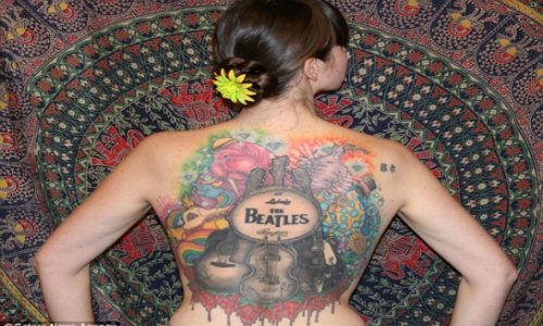 Superfan spends 50hrs getting giant back tattoo dedicated to Beatles - PHOTO