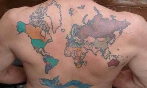 Lawyer tattoos world map on back, colors in countries he visits