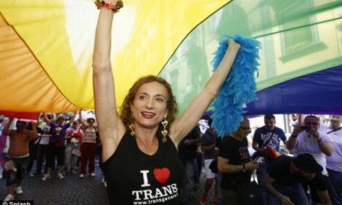 Italy's first transgender MP arrested in Sochi for carrying 'Gay is OK' rainbow flag