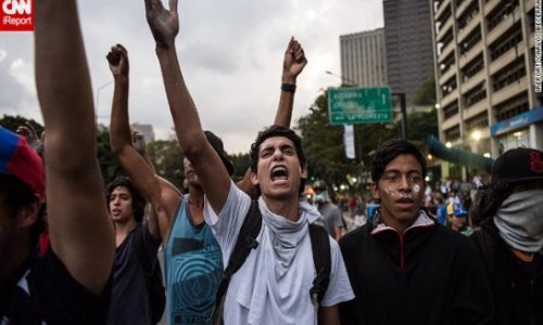 Cheered by supporters, Venezuelan opposition leader Lopez surrenders