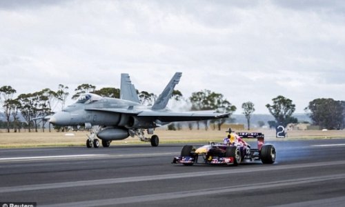 Formula One race car takes on F-18 Hornet fighter jet - PHOTO+VIDEO