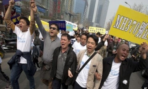 Malaysia Airlines MH370: Relatives in Beijing scuffles