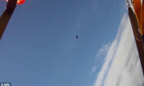 Skydiver is nearly hit by a falling METEORITE - VIDEO