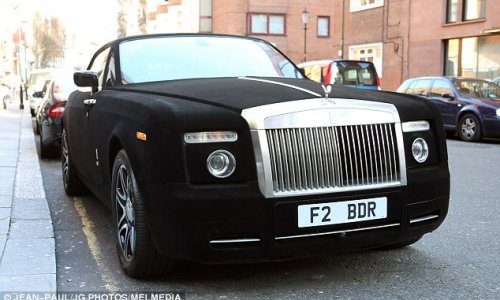 Rolls Royce covered in BLACK VELVET is spotted outside Harrods