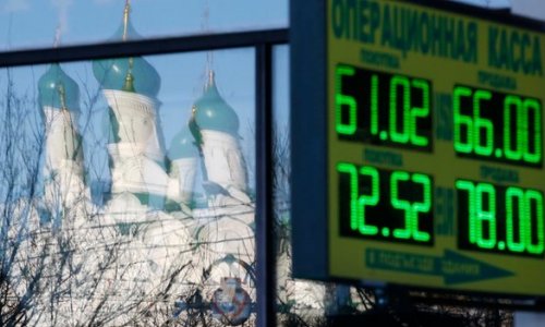 Russia's credit rating is cut to junk by S&P