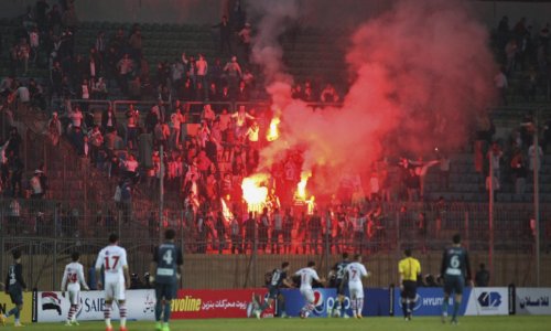 Soccer fans clash with the police in Cairo; at least 19 dead
