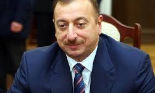 Azeri president calls manat's devaluation necessary measure