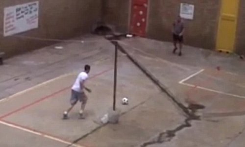 Pictured: Oscar Pistorius 'playing football in PRISON yard