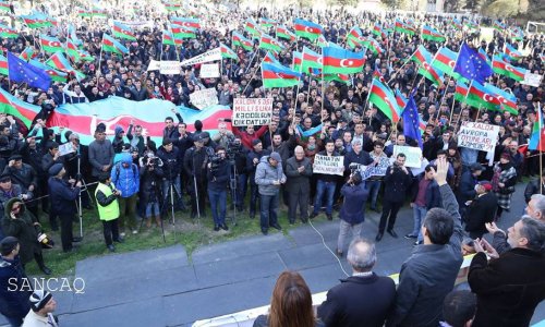 Azeri opposition holds rally as economy slows