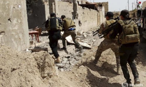 Iraqi forces fight IS militants at gates of Anbar provincial capital