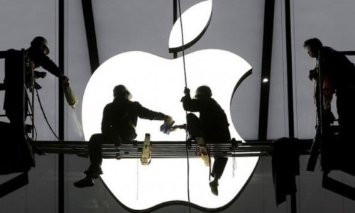 Apple to return more cash to investors as profits soar