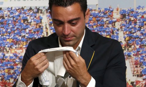 Barcelona's Xavi weeps during farewell tribute