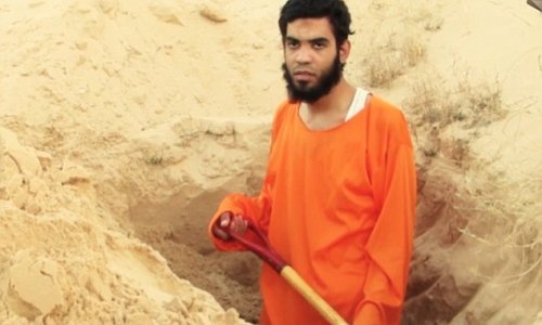 Prisoner forced to dig his own grave in the desert