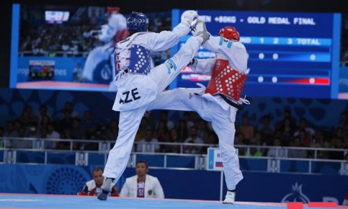 Joker Isaev keeps cool head to land Taekwondo gold for hosts