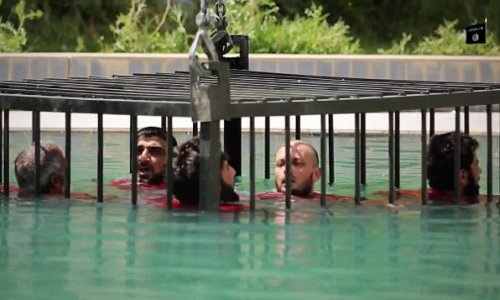 Sickening new ISIS video shows caged prisoners