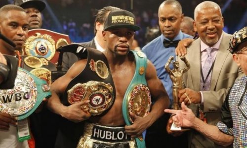 Mayweather stripped of title he won in Pacquiao fight