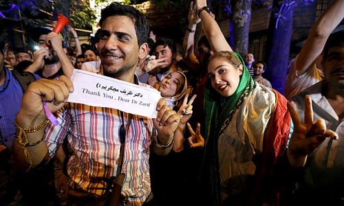 Iranians take to Tehran streets to hail nuclear deal