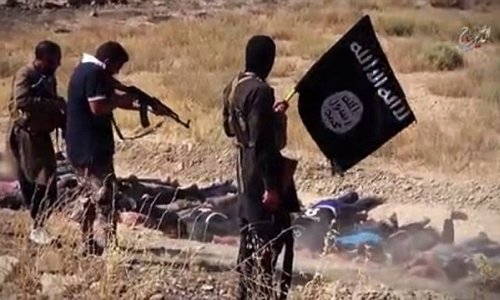 ISIS child executioner ignores prisoners' pleas to spare them