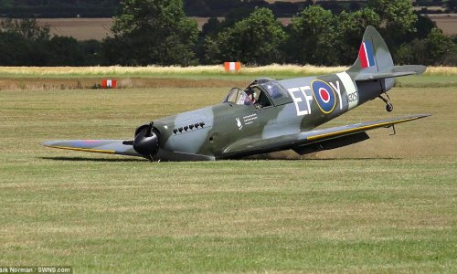 Incredible moment a pilot landed his Spitfire without any WHEELS