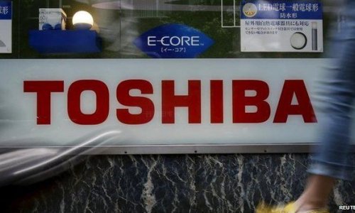 Toshiba chief executive resigns over scandal