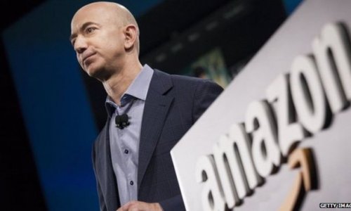 Amazon shares surge after surprise profit