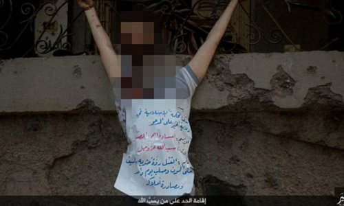 ISIS thugs behead blindfolded man and crucify his corpse ...