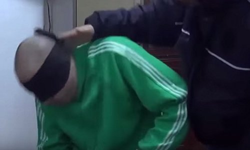 Shocking video of playboy son of former dictator Colonel Gaddafi 'being tortured in a Libyan prison'