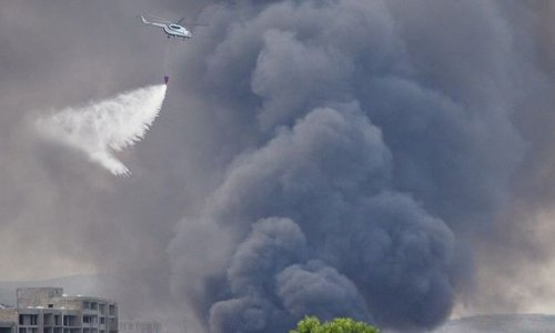 Пожар в Тбилиси: огонь тушили с помощью вертолетов