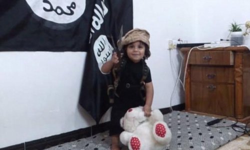 Shocking new ISIS video shows baby-faced three-year-old boy behead his TEDDY BEAR