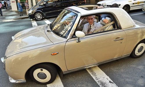 'World's oldest drug mule', 91, zooms off in a 1960s sports car