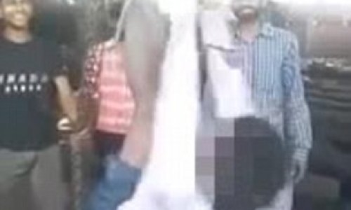 Migrant worker being strung up by his hands and feet and beaten for 34 MINUTES