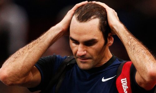 Roger Federer knocked out in Paris by John Isner's power