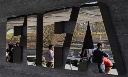 U.S. charges 16 FIFA officials in widening probe