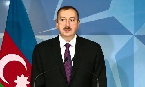 Aliyev says manat’s devaluation caused by oil price slump