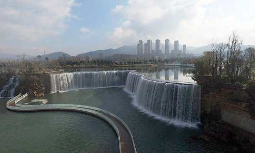 China unveils its new man-made WATERFALL