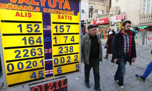 Azerbaijan limits currency exchange amid currency slide