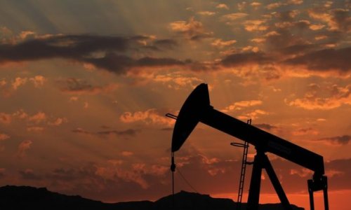 Oil prices spike on output meeting