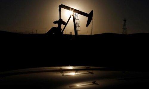 Oil jumps as yuan hits 2016 high; investors put fresh cash into oil