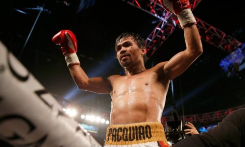 Manny Pacquiao beats Bradley, hints at retiring