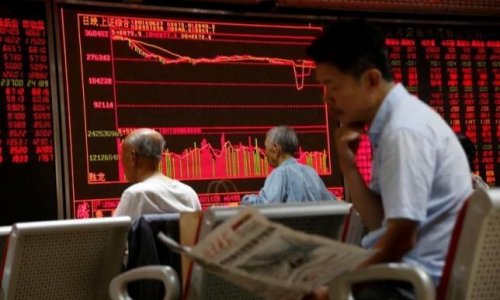 Asian shares dip, crude oil extends losses