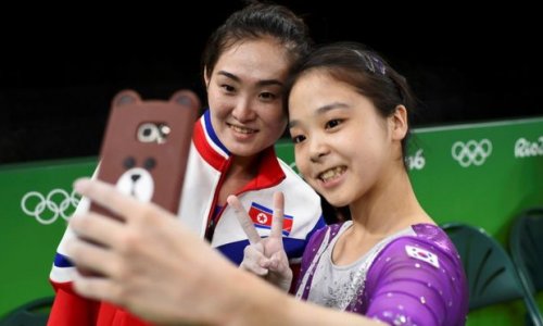 North and South Korean gymnasts pose for Olympic selfie